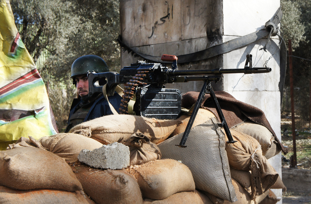Un poste de contröl de l'armée syrienne en 2012 (© Elizabeth Arrott)